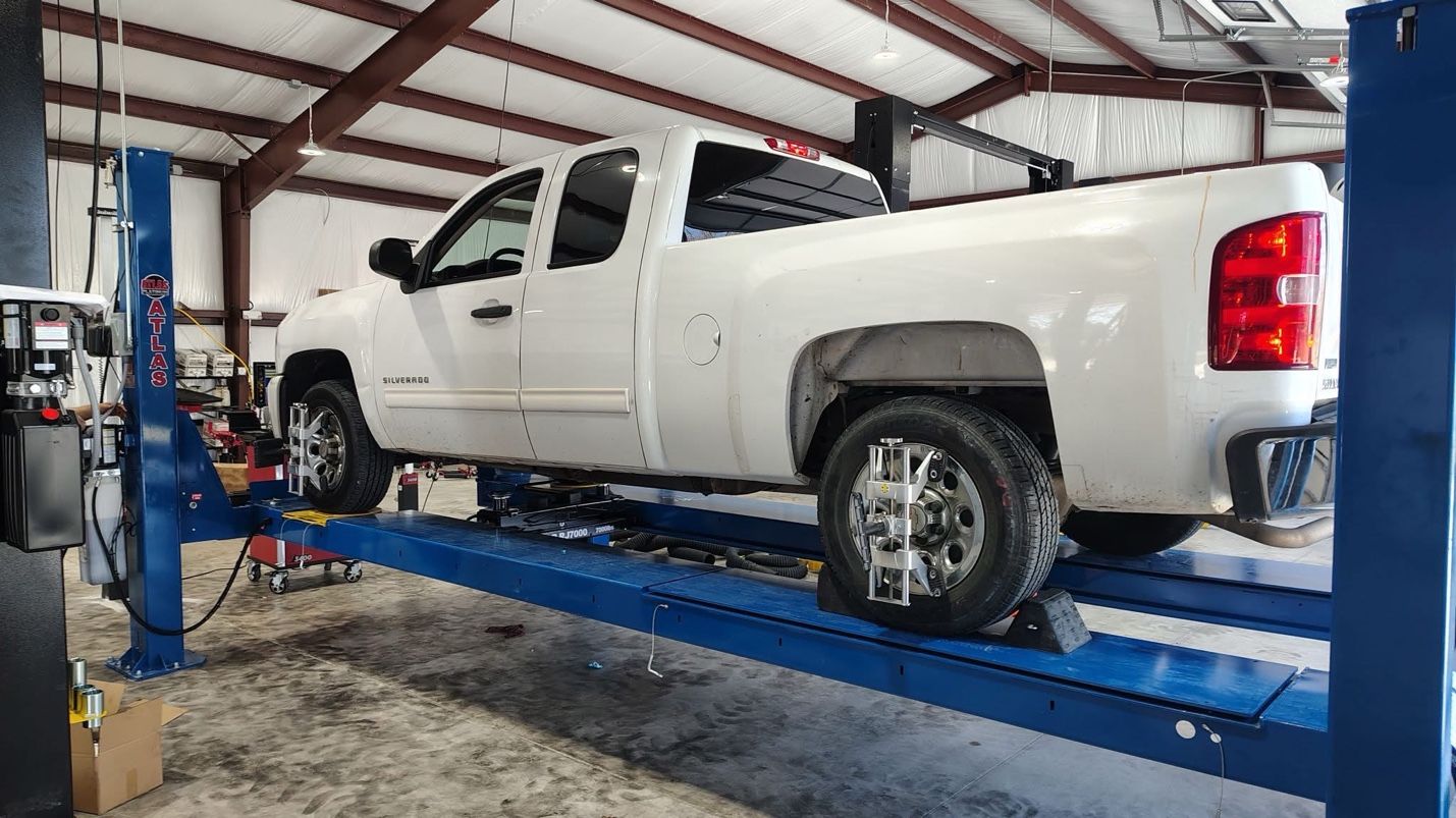 Vehicle on lift at Nemtec Automotive - professional auto repair Bentonville AR